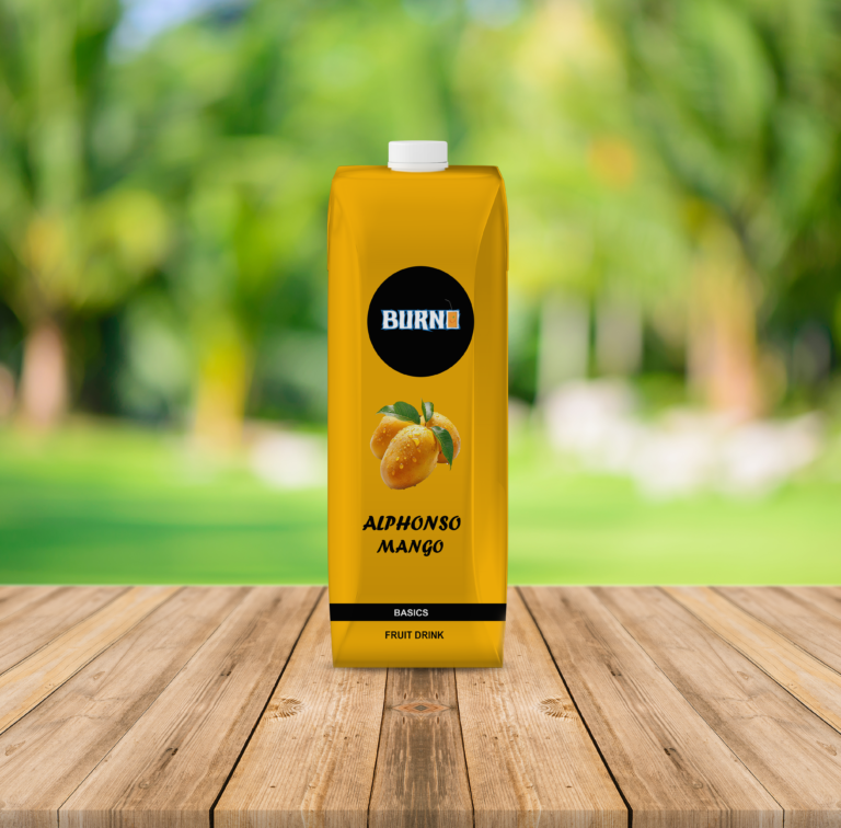 A tall, vibrant yellow juice carton of "Burn" brand Alphonso Mango fruit drink, standing centered on a rustic wooden tabletop.
